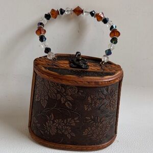 Elegant Brown Floral Handbag with Beaded Handle